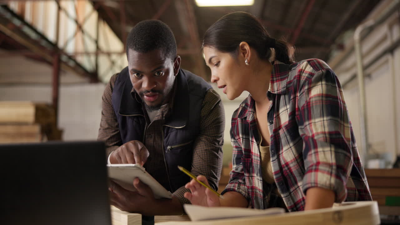 Carpentry team working together in a warehouse