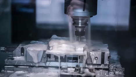 workshop metal turner with male engineer metalworker industrial experienced operator technician worker skilled machinist working intently on a large industry in metal factory with large machines