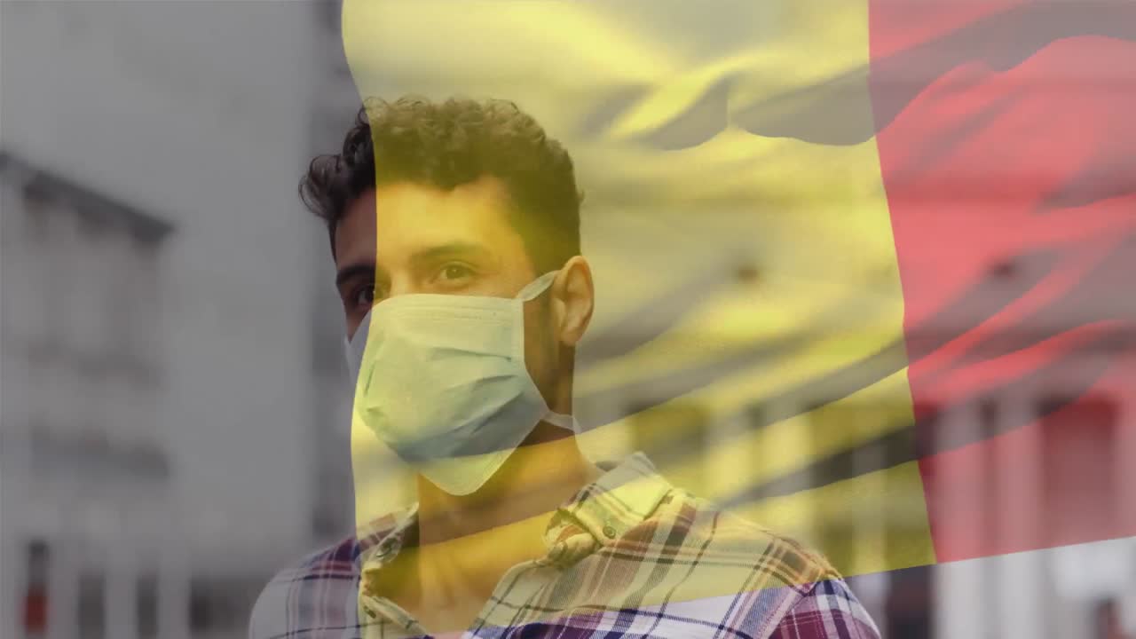 코로나19 유행 기간 동안 얼굴 마스크를 쓴 남자가 벨기에 국기를 흔들고 있는 애니메이션