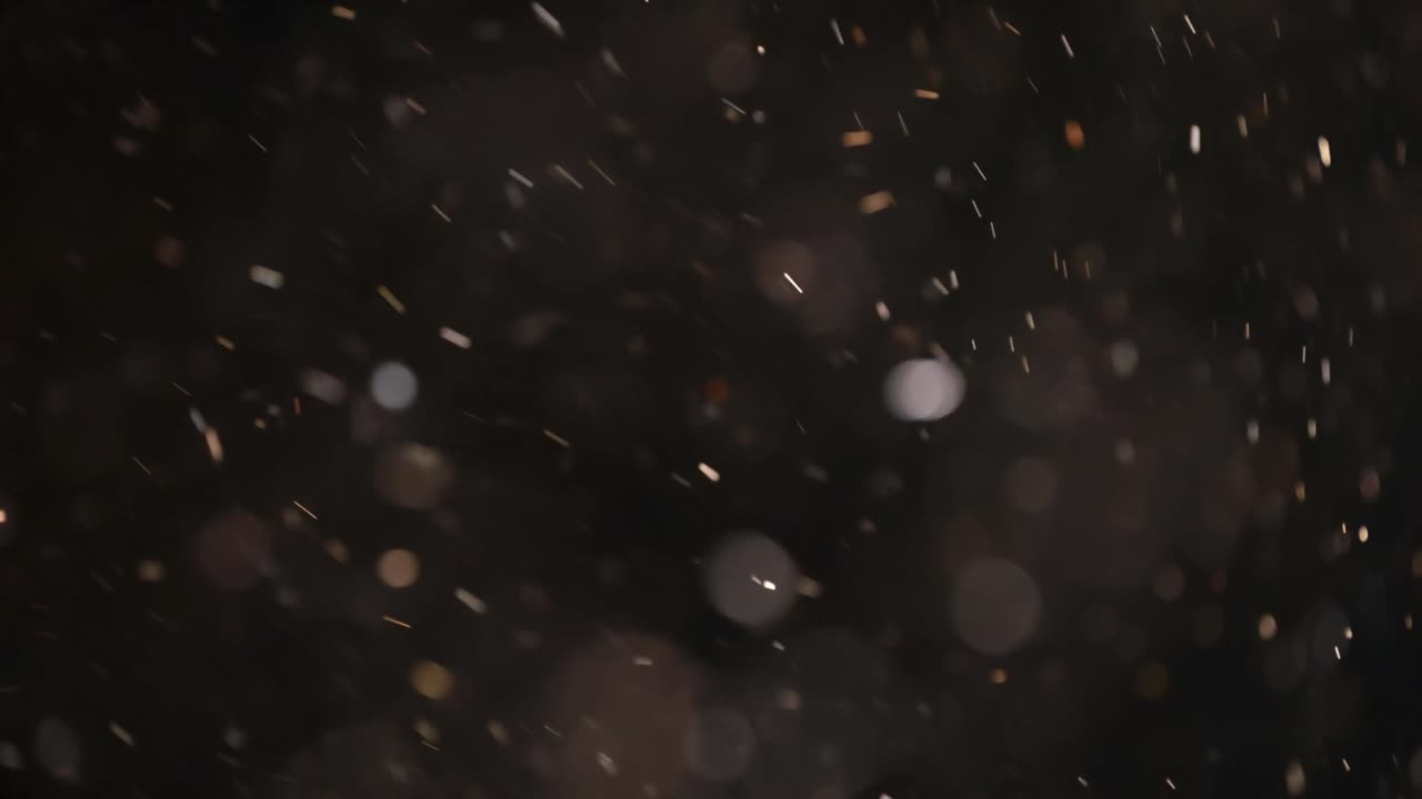 bokeh de partículas abstractas flotantes sobre fondo oscuro