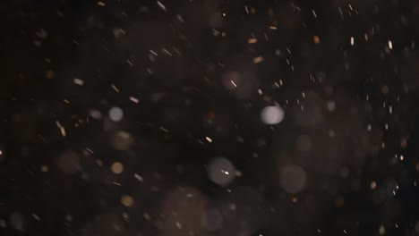 bokeh de partículas abstractas flotantes sobre fondo oscuro