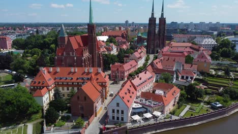 drone view of wonderful and bright cathedral island in wroclaw in summer sun - poland