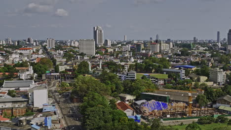 colombo sri lanka aerial v11 establishing low drone flyover area 10 capturing excel world entertainment park, nawam mawatha and downtown cityscape on the skyline - shot with mavic 3 cine - april 2023