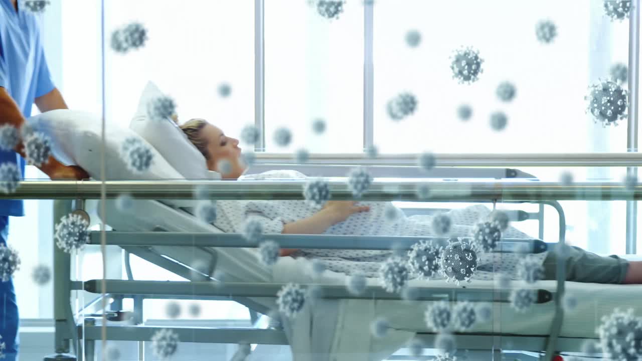 코로나19 세포가 여성 환자를 운전하는 의료 전문가를 상대로 떠다니고 있습니다.