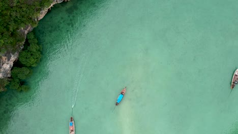drone footage of hong island lagoon with boats navigating trough-5