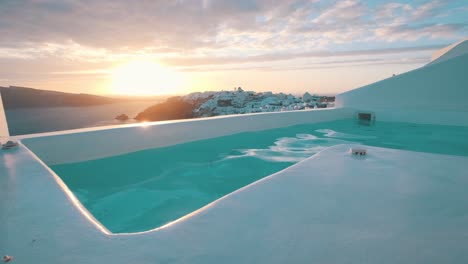 Big-jacuzzi-pool-in-front-of-Oia-village,-Santorini