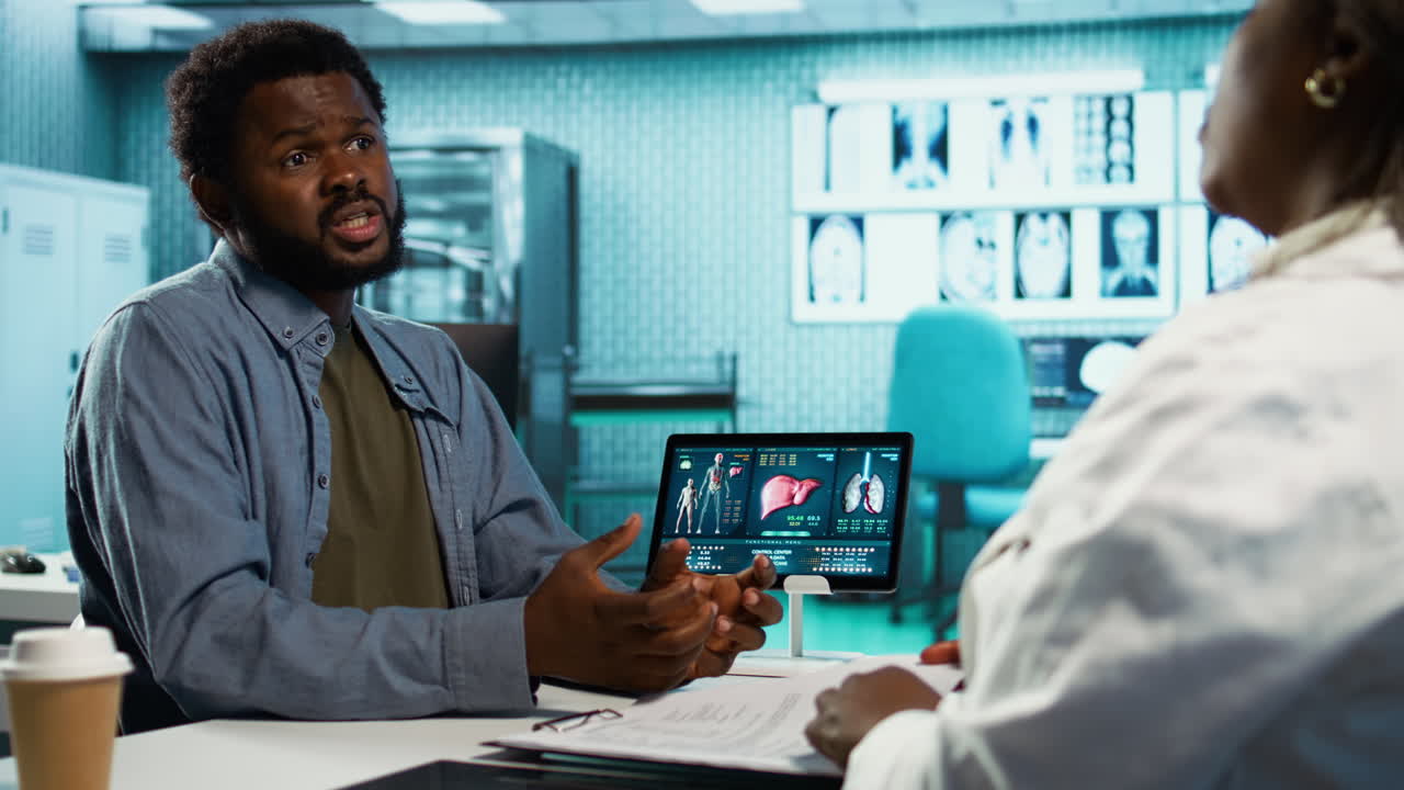 Medical consultation featuring a doctor advising a young man on diagnostics