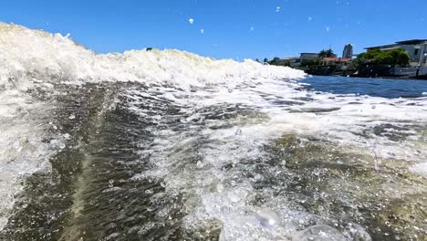 powerful wave crashing on sunny gold coast