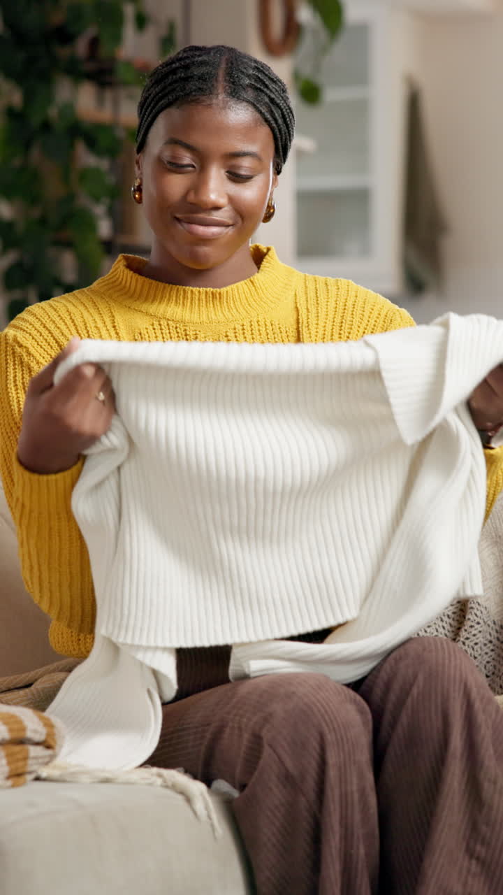 Woman holding a white sweater