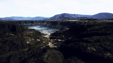 Glacier-epic-mountain-formations-under-dark-clouds