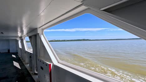 scenic river view from a moving boat