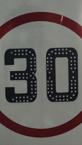 speed limit 30 sign with reflective digits