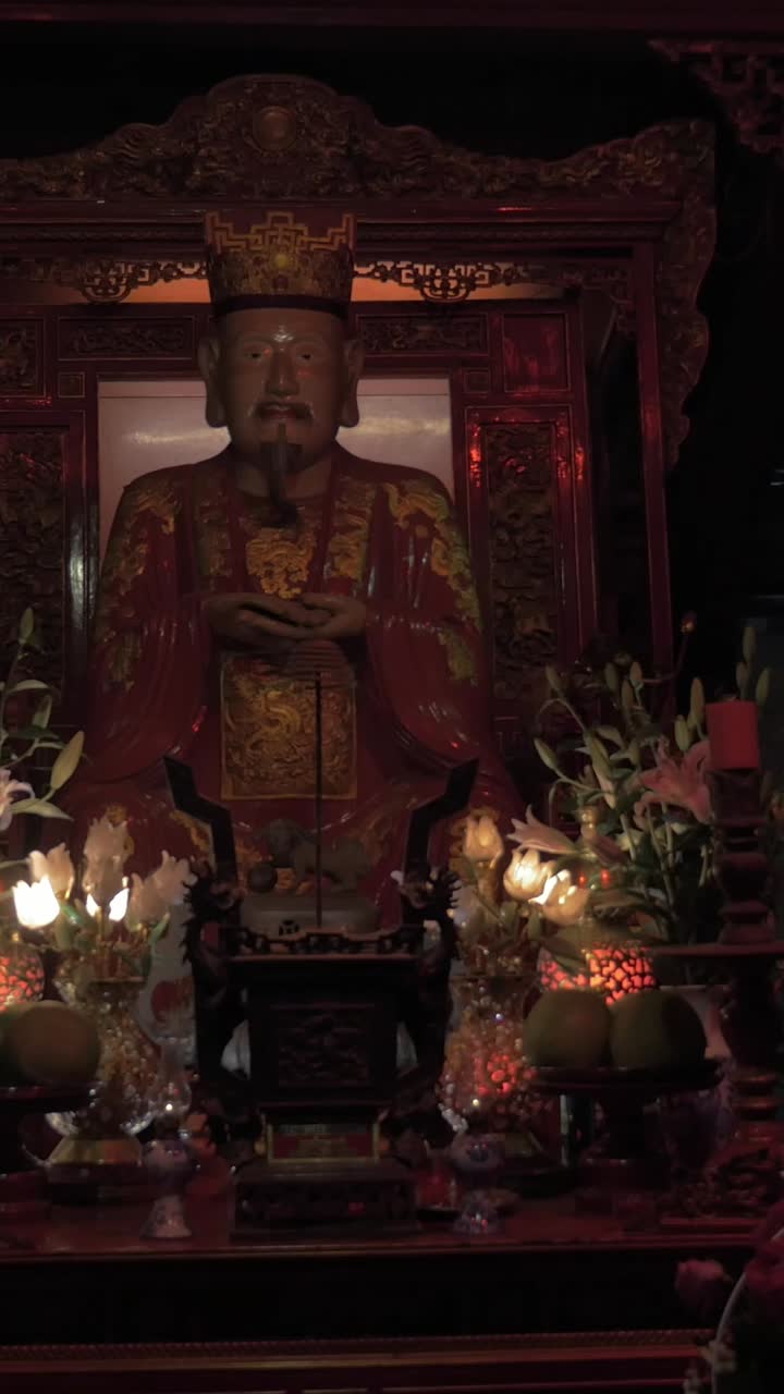Ornate Statue of a Deity in a Traditional Temple Altar