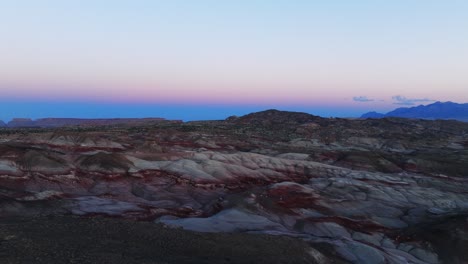 flying over bentonite hills, utah in usa