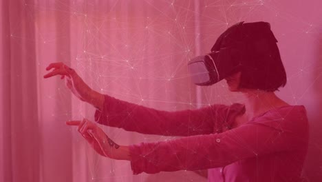 Animation-of-network-of-connections-over-caucasian-businesswoman-using-vr-headset