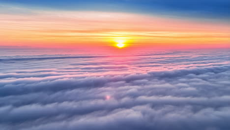 a breathtaking sunset above a sea of clouds