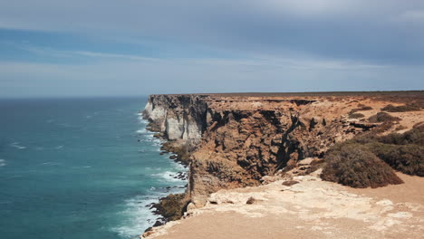 close up shot of young woman posing and enjoying the beautiful view of the australian coast