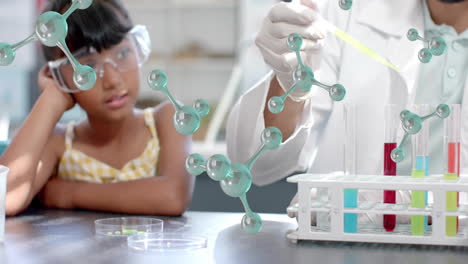 scientist handling test tubes with molecular structures over curious child in laboratory