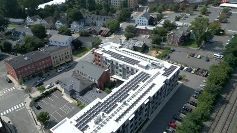 aerial tilt up above new apartment building complex reveals downtown northampton massachusetts