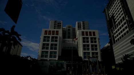 Looking-at-a-building-in-Bangkok-with-the-flag-of-Thailand