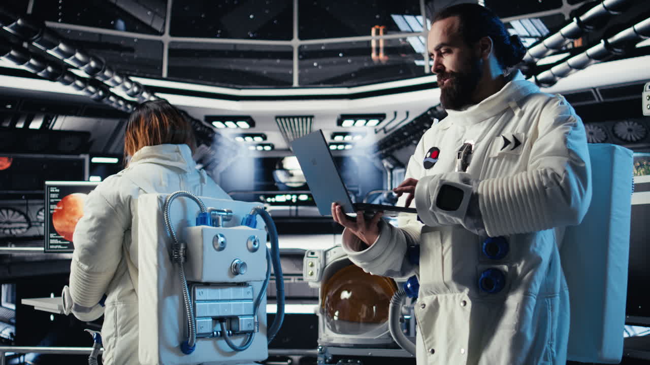 Astronauts in advanced technology spacecraft working together