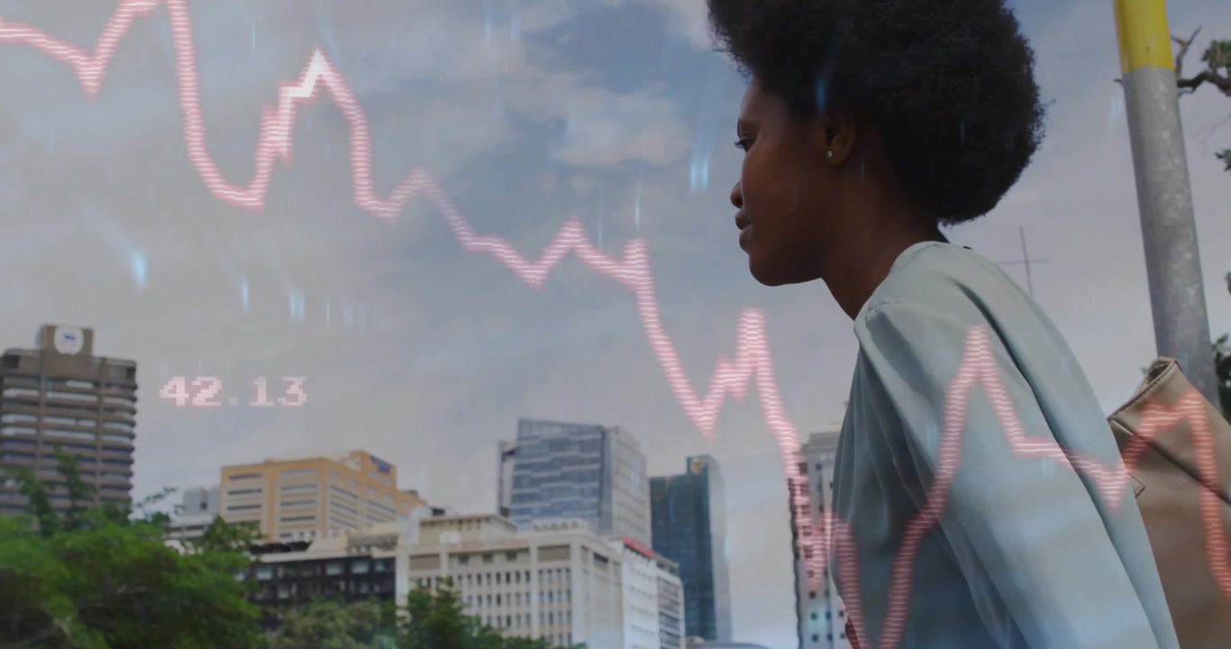 African American Woman Observing Digital Financial Data Overlay in City