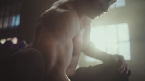 man working out with dumbbells