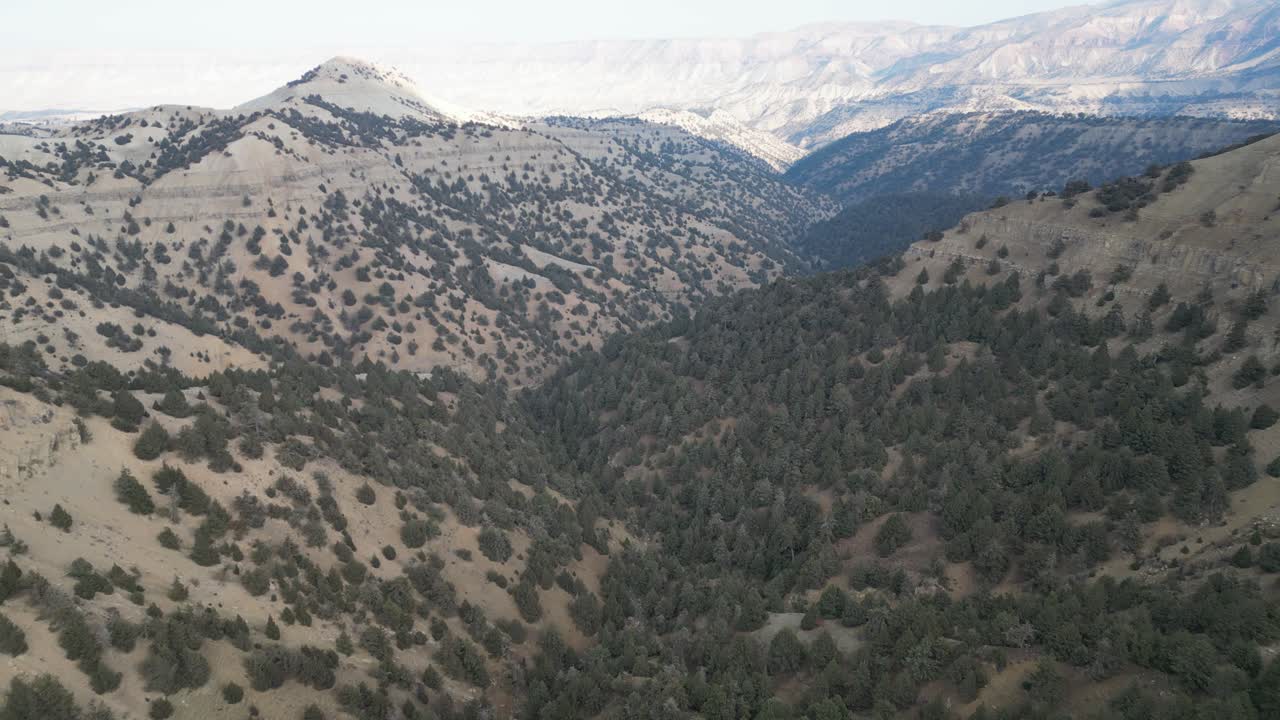 Siah Koh mountains Afghanistan Drone Aerial flight over wilderness and arid, remote barren desert ridges, Badghis
