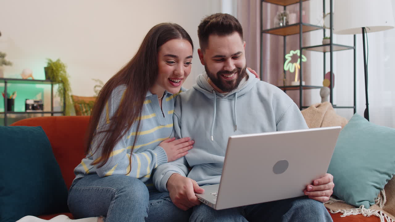 Family man woman at home looking at camera making video conference call with friends or family
