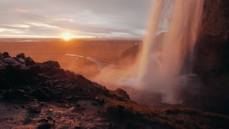 slow motion shot of seljalandsfoss at sunset, a famous waterfall in iceland