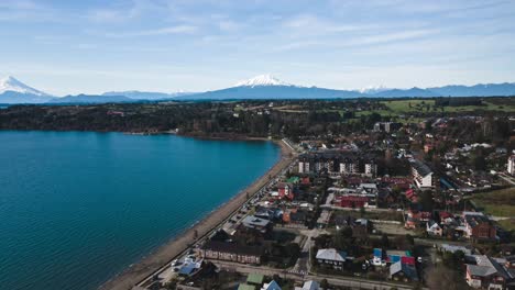 aerial dolly out hyperlapse of the coastal area of puerto varas, chile