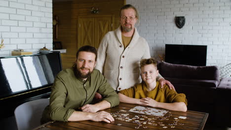 Caucasian-men-and-boy-in-the-living-room