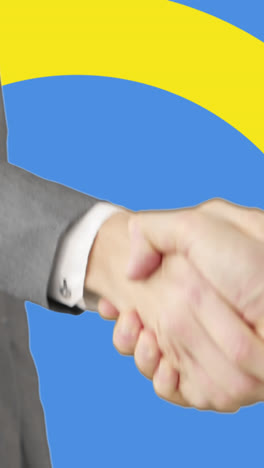 animation of caucasian business people shaking hands over flag of ukraine