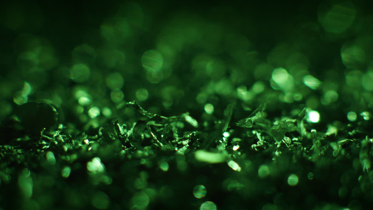 Emerald color metal fillings in macro