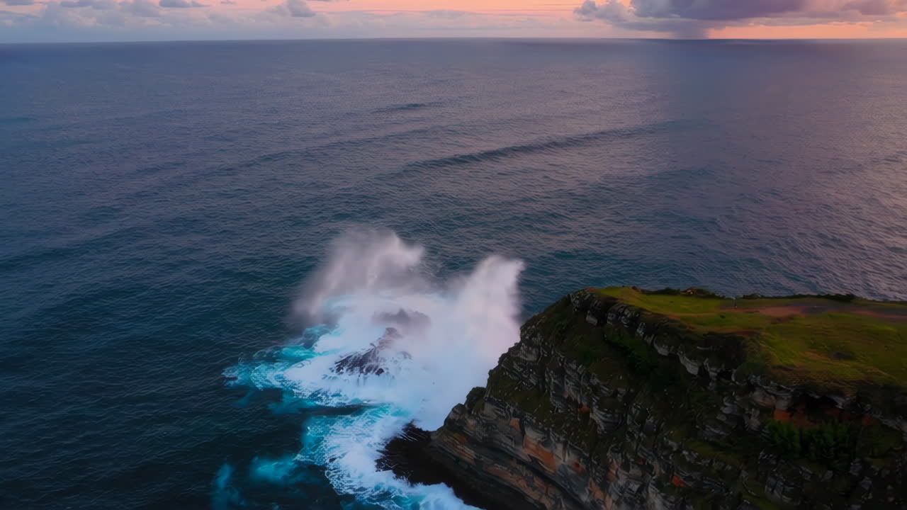 Ocean Sunset Waves Crashing Against a Cliff