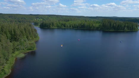 Aerial-view-lake-and-forest-in-beautiful-countryside-of-Sweden