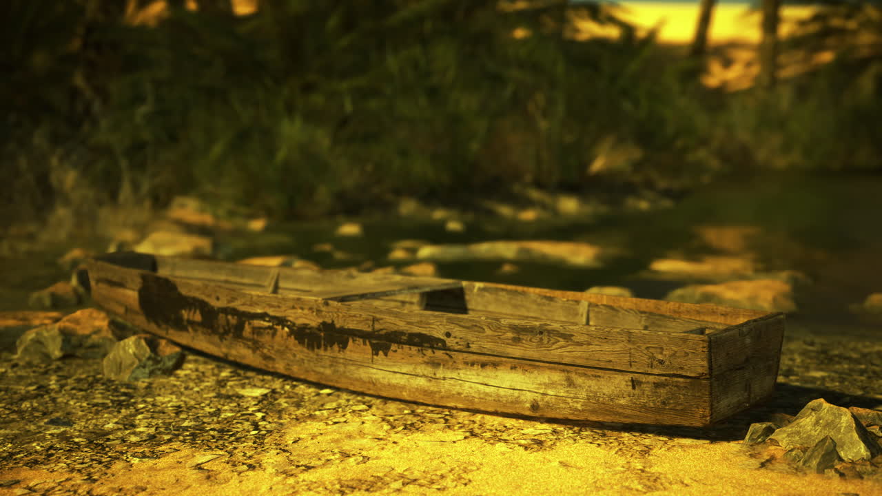 Old wooden boat resting on shore surrounded by lush greenery and sunlight