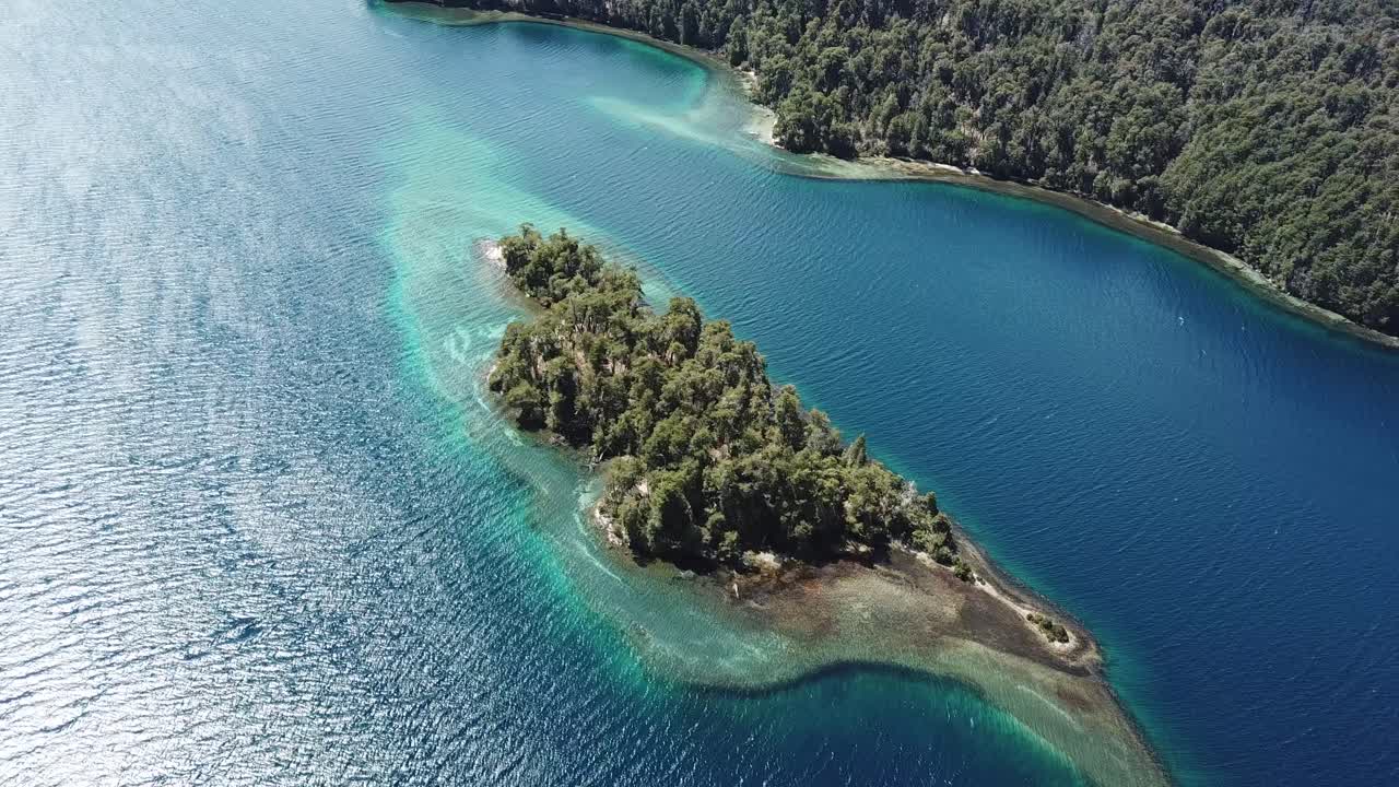 Drone Aerial View of Island in Espejo Grande Lake, Patagonia, Chile. Blue Water and Green Forest Landscape