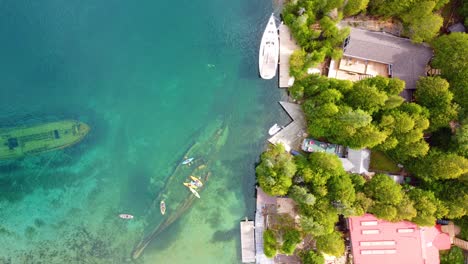 wrecks or shipwrecks under the surface of the water next to the seashore