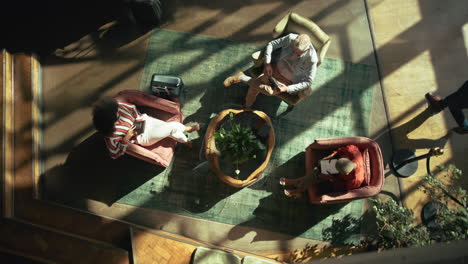 overhead view of people in a modern lobby