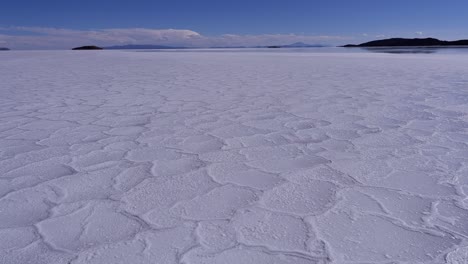 patch pattern in evaporated saline lake of uyuni salt flat in bolivia