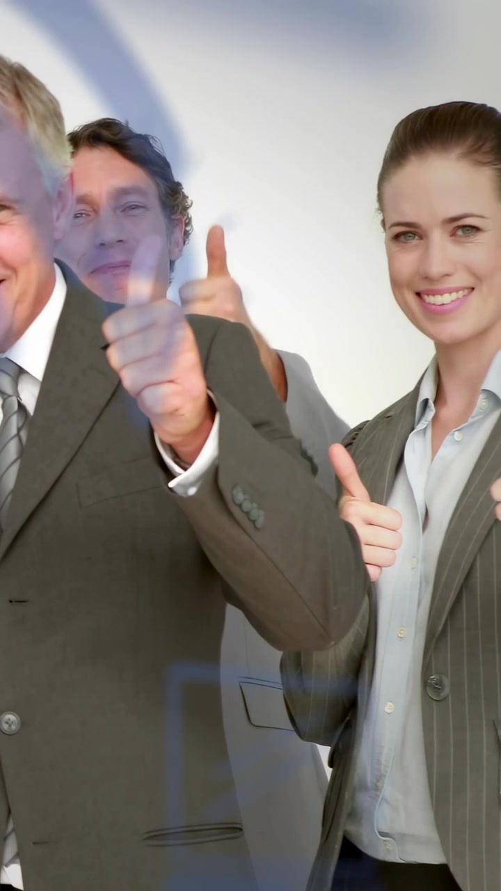 Camera cueing business team for promo front man turning crew raising thumbs blue graphic crossing