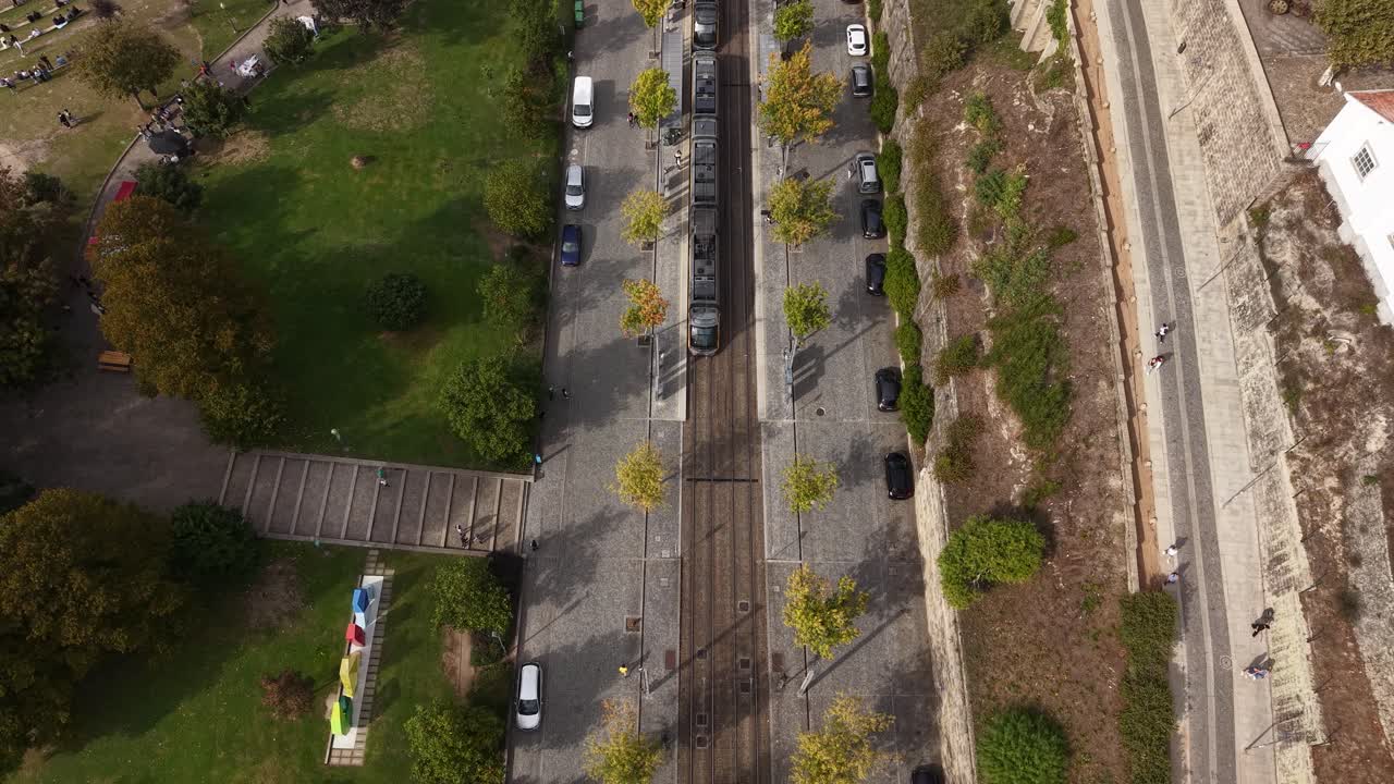 Porto, Portugal. Drone Shot of Metro Train and Railway in Vila Nova de Gaia Neighborhood