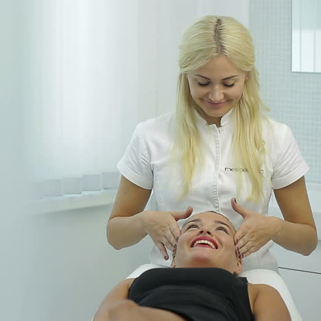 close-up of a young woman getting spa treatment at beauty salon. spa face massage. facial beauty treatment. spa salon.