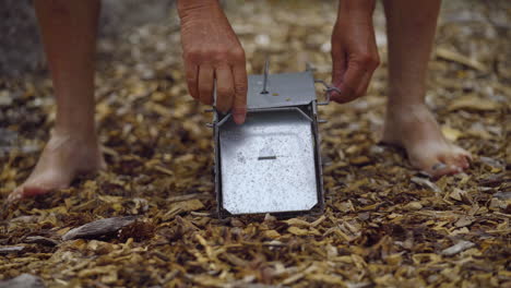 Close-Up-on-Animal-Trap-Opening-to-Release-Bird