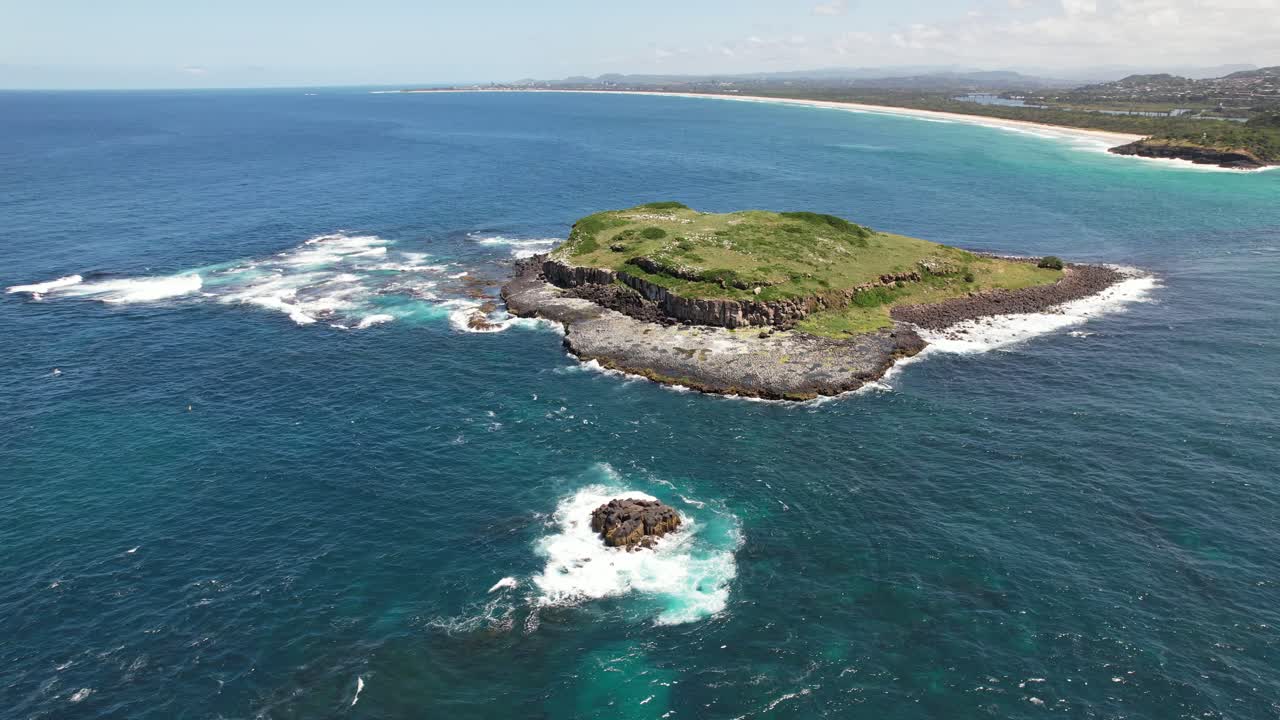 Cook Island Aquatic Reserve And Mary's Rock Offshore From Fingal Head In New South Wales, Australia. aerial orbiting shot
