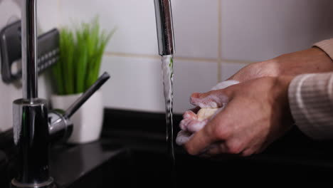 person washing hands