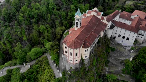 Aerial-view-of-the-historical-Madonna-del-Sasso-church-overlooking-the-city-of-Locarno-next-to-Lago-Maggiore-in-Ticino-in-south-Switzerland