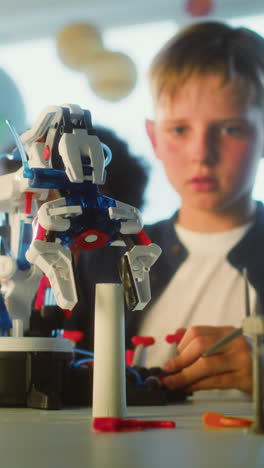 Kids Building and Playing with Robots