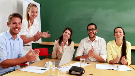 casual business team clapping at presentation